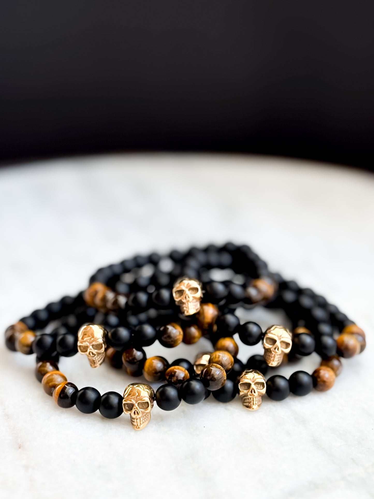 XXII. Onyx, Tiger Eye & Gold Skull Bracelet