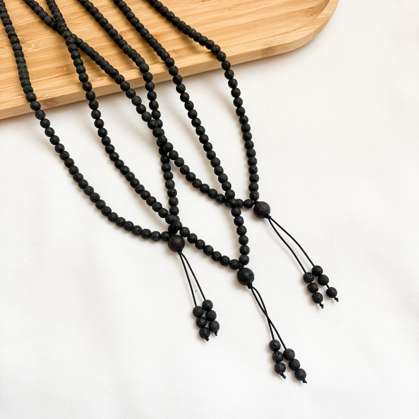I. Lava Stone Mala Necklace