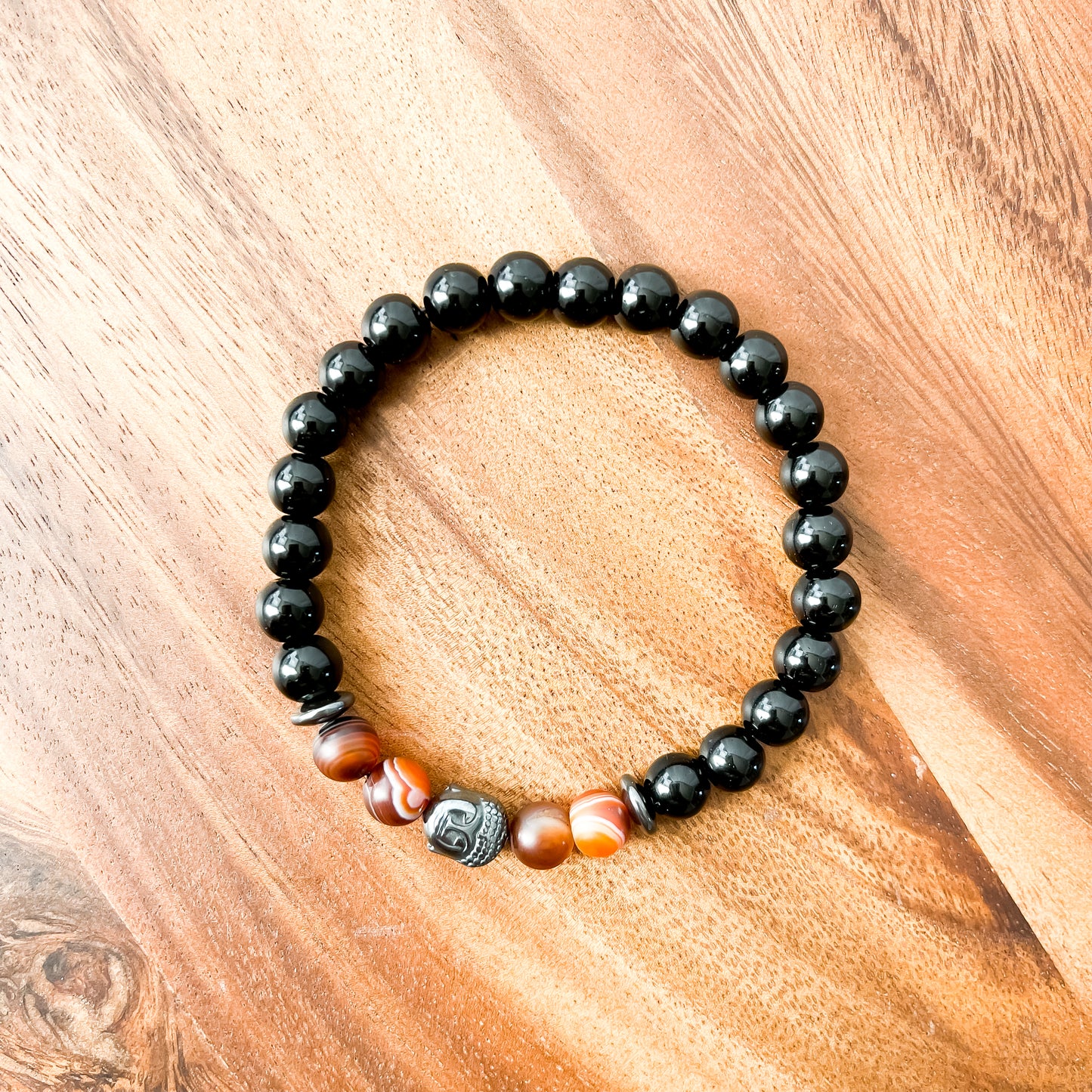 VIII. Shiny Black Obsidian, Brown Striped Agate and Hematite Buddha