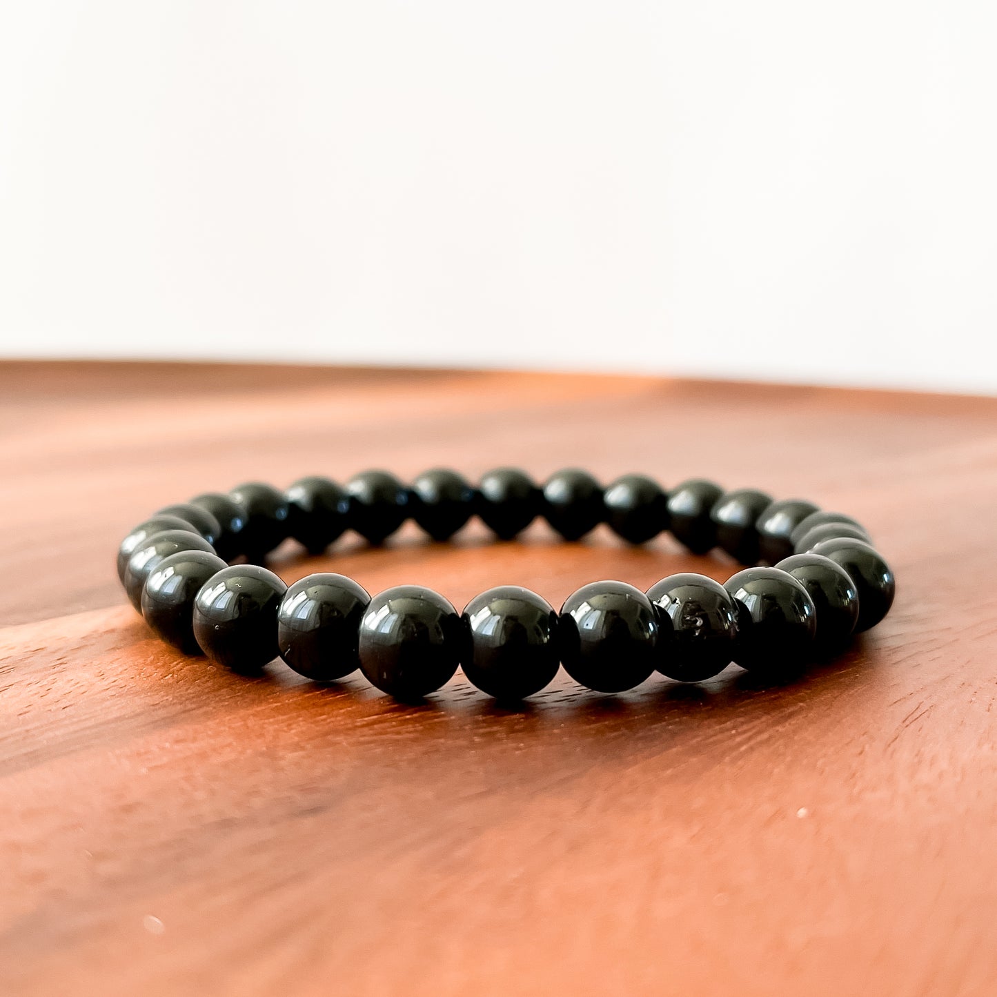 I. Shiny Black Obsidian Bead Bracelet