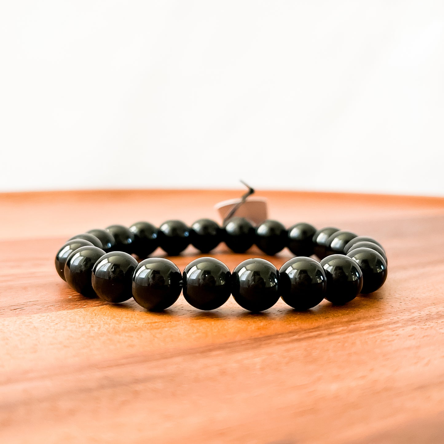 I. Shiny Black Obsidian Bead Bracelet