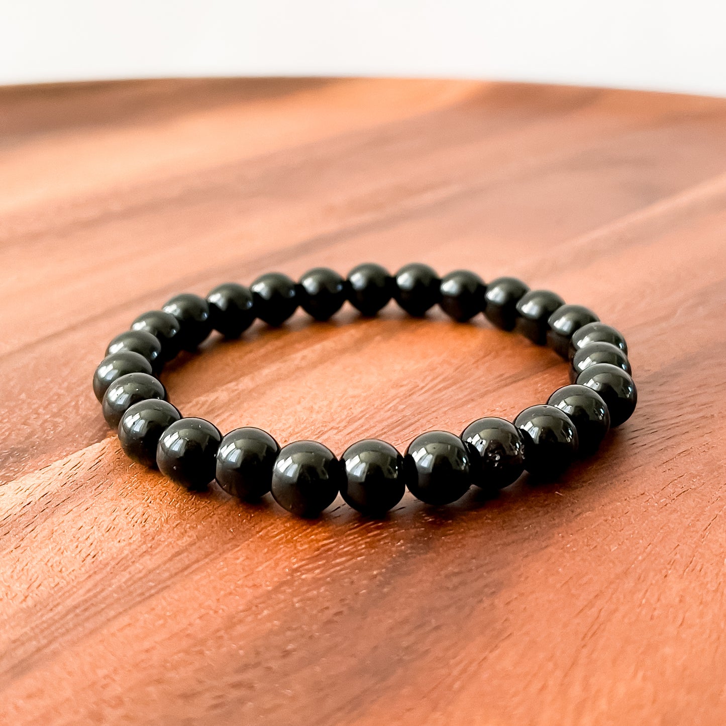 I. Shiny Black Obsidian Bead Bracelet