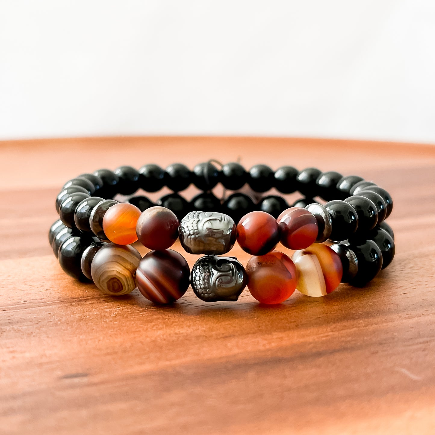 VIII. Shiny Black Obsidian, Brown Striped Agate and Hematite Buddha