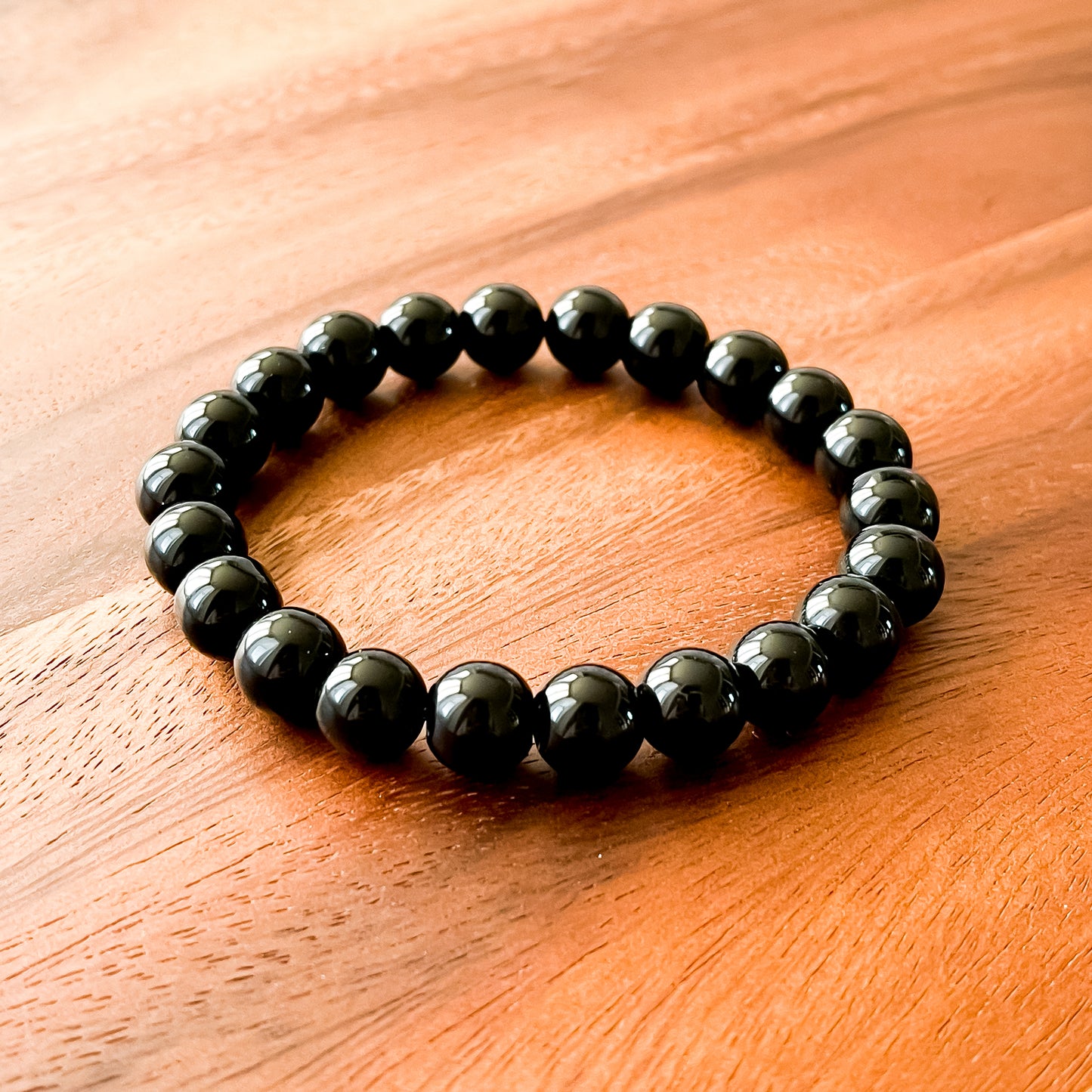 I. Shiny Black Obsidian Bead Bracelet