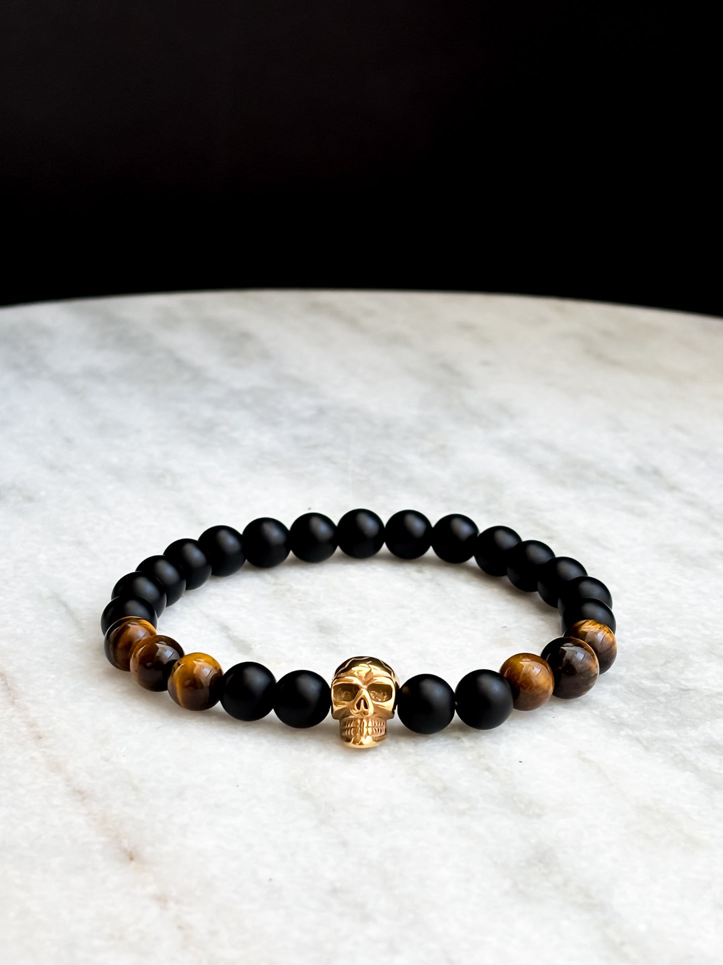 XXII. Onyx, Tiger Eye & Gold Skull Bracelet