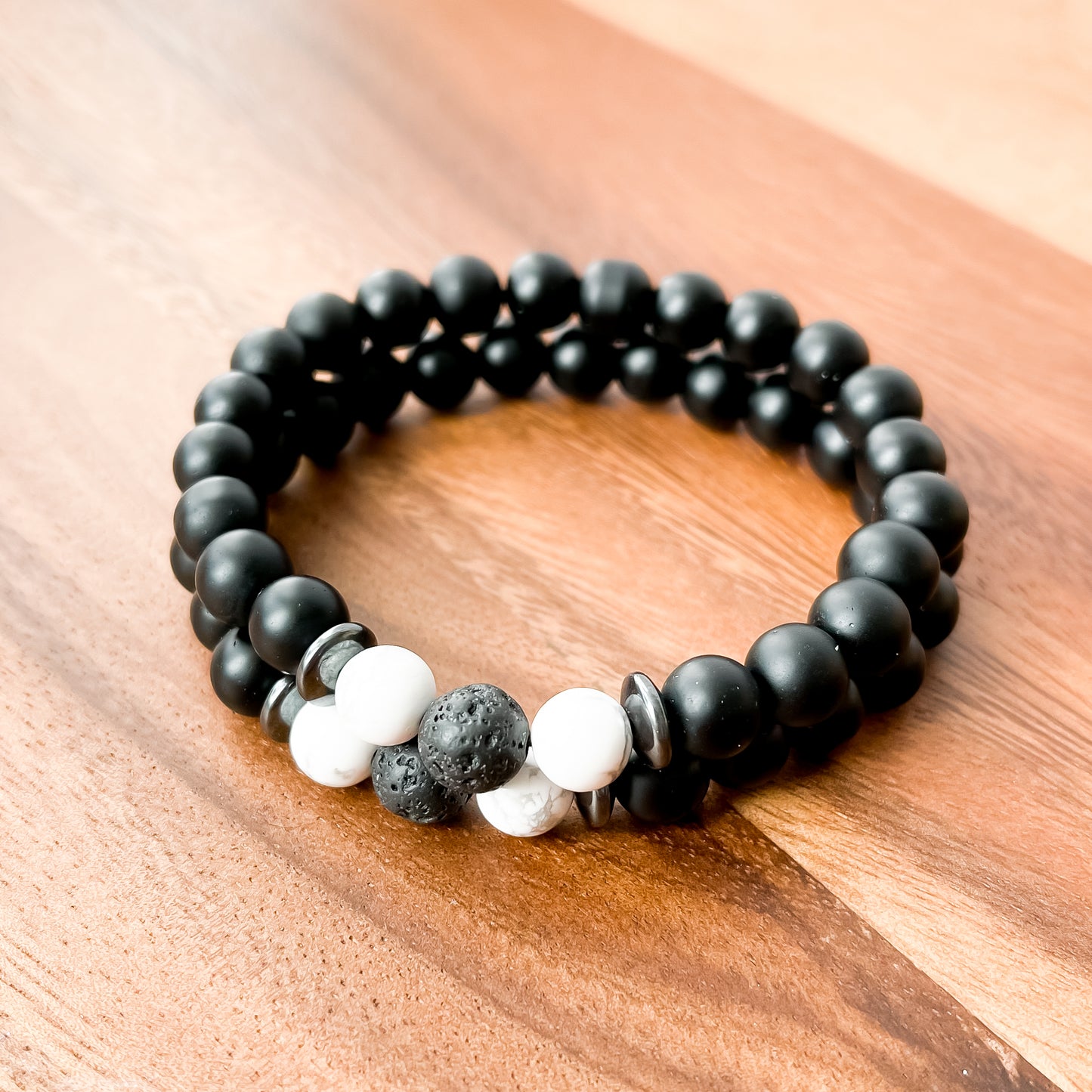 V. Matte Black Onyx, White Howlite, Lava and Hematite Bracelet