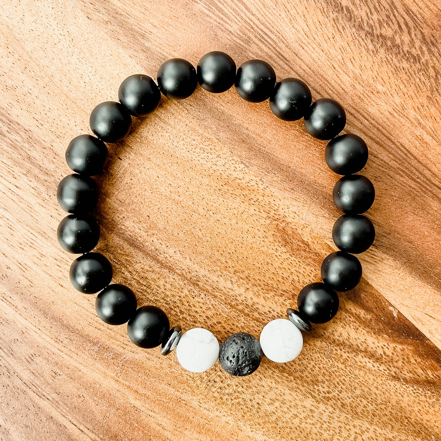 V. Matte Black Onyx, White Howlite, Lava and Hematite Bracelet