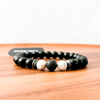 V. Matte Black Onyx, White Howlite, Lava and Hematite Bracelet