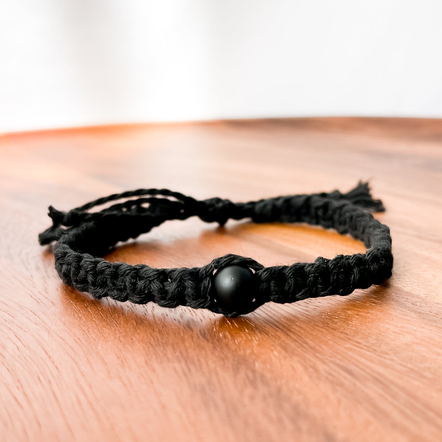 XI. Macrame Bracelet with Matte Black Onyx