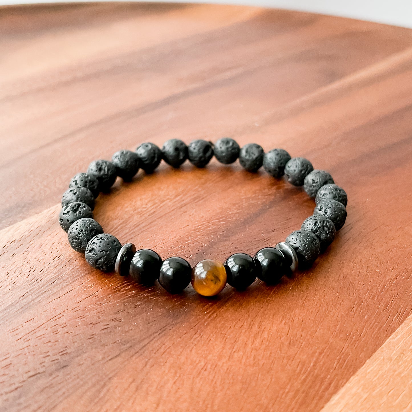 VI. Lava Stone, Black Obsidian and Tiger Eye Bead Bracelet